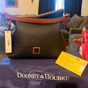 Dooney & Bourke Black pebble-grain twist strap hobo.  New never worn